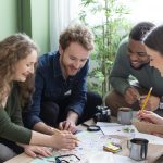 Master Social Skills for Success: Tips to Connect and Thrive medium-shot-people-planning-trip-together